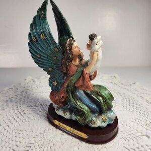 Adeline Collection Figurine Angel Holding a Baby Sitting on a Cloud on a Base